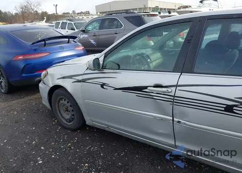 2005 Toyota Camry Le from USA, damaged, VIN 4T1BE32KX5U088996